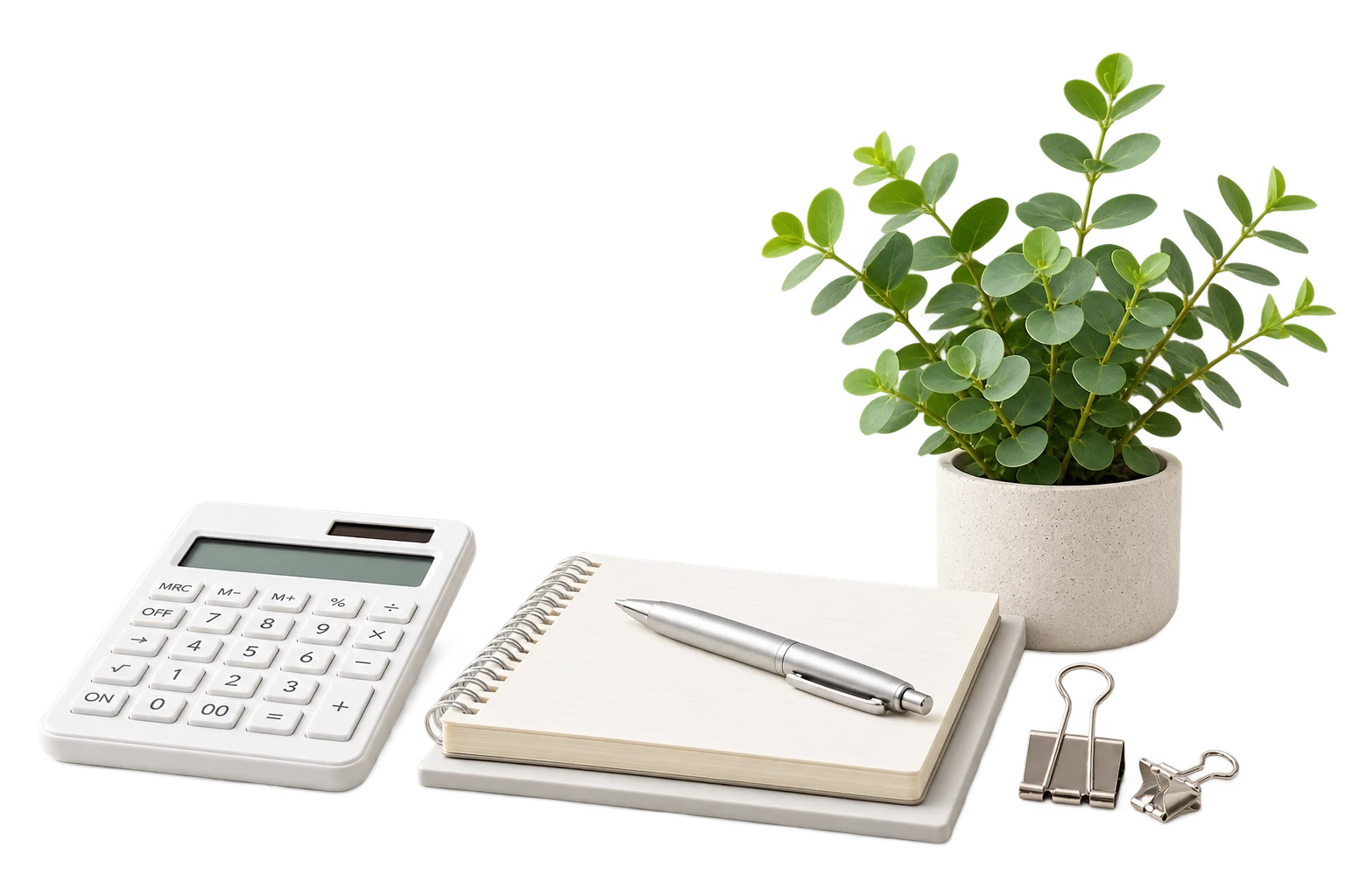 電卓とノート、観葉植物のイメージ